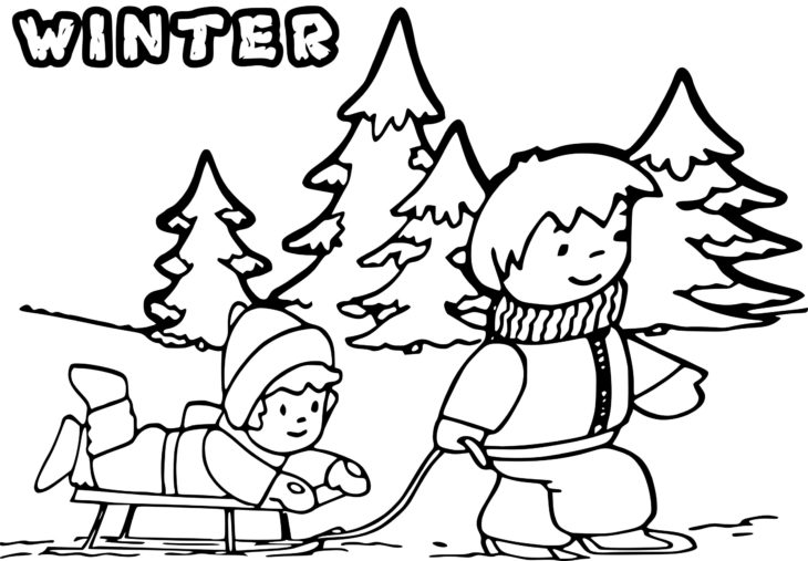 Child coloring under the snow